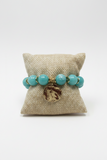 Teal Acrylic Beaded Bracelet With Golden Dangly Charm