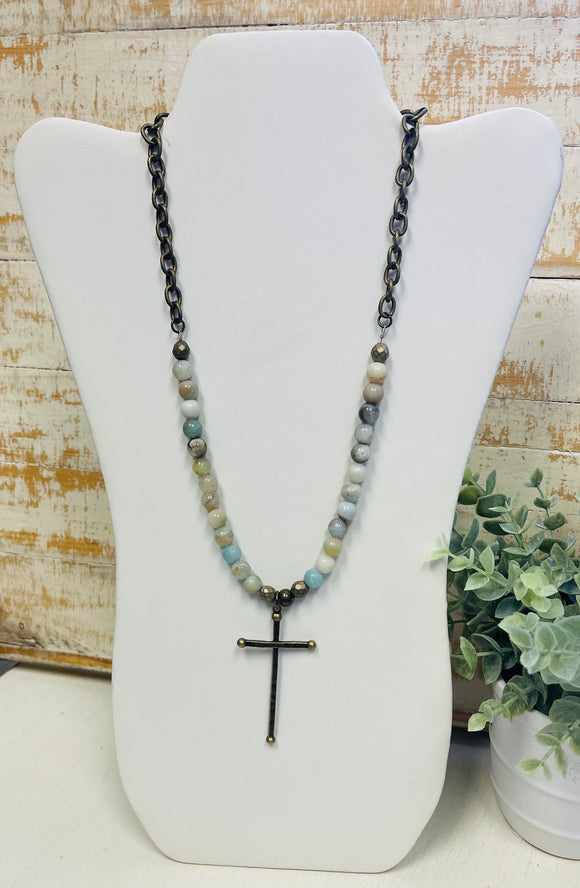 Natural Stones With A Metal Cross