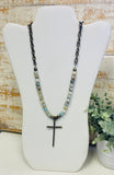 Natural Stones With A Metal Cross