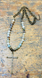 Natural Stones With A Metal Cross