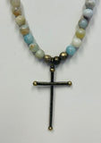 Natural Stones With A Metal Cross