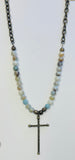 Natural Stones With A Metal Cross