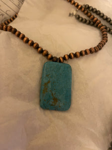 Beautiful Turquoise Pendant With A Copper Necklace