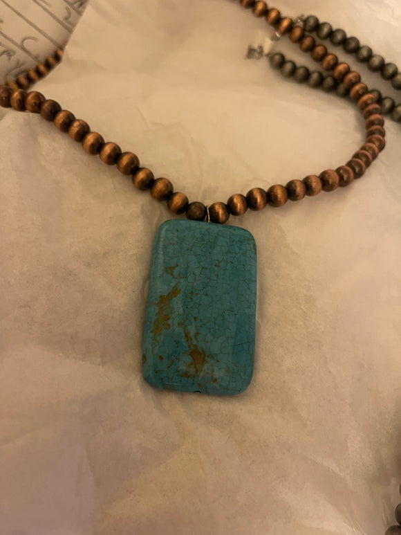 Beautiful Turquoise Pendant With A Copper Necklace