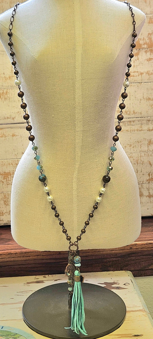 Long Beaded Cross With Tassle