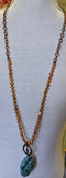 Turquoise Stone With Orange Beads